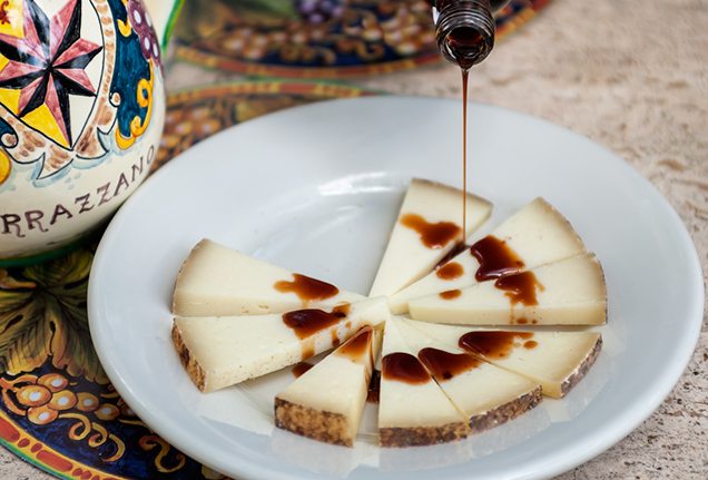 Cheese and balsamic vinegar during a wine tasting at Vincigliata Castle, Florence