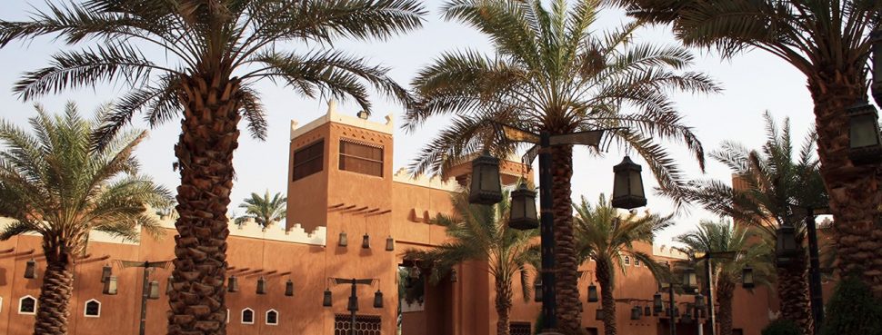 Palm trees and building