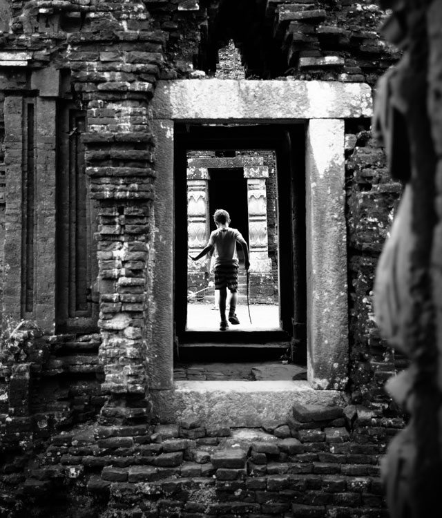 Ruins with boy in Vietnam