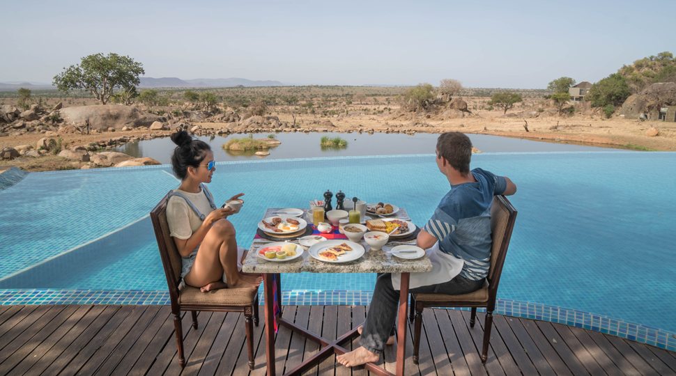Bloggers Marcy Yu and Robert Michael Pool enjoy a private breakfast at the Four Seasons Serengeti