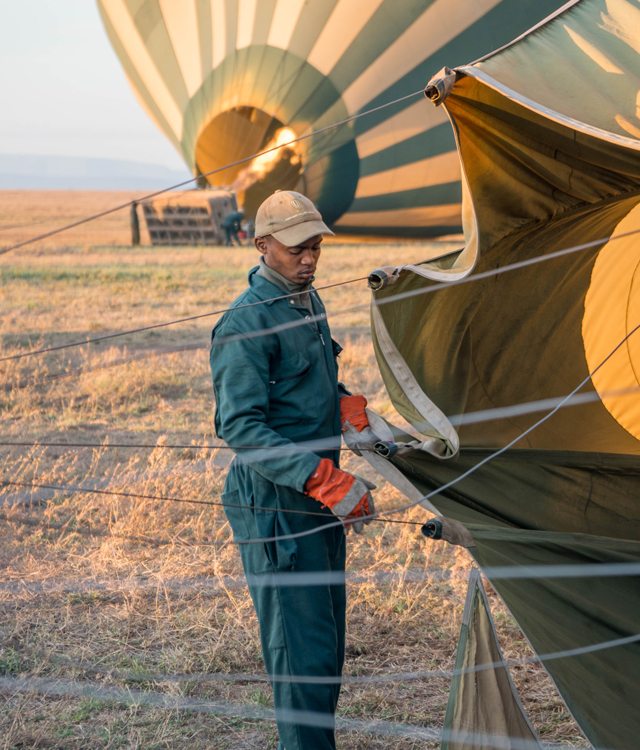 A hot air ballon operator at the Four Seasons Serengeti