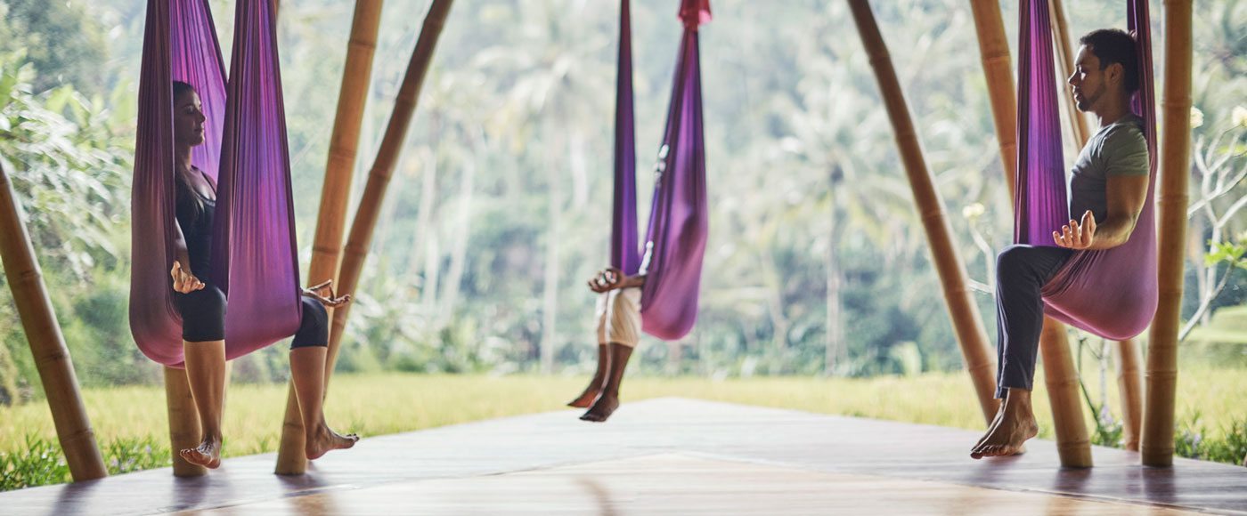 An Antigravity yoga class in sesson at Four Seasons Bali