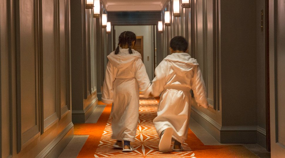 Two kids walking the halls