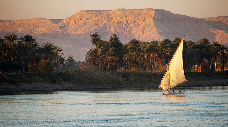 Felucca boat sails down the Nile River