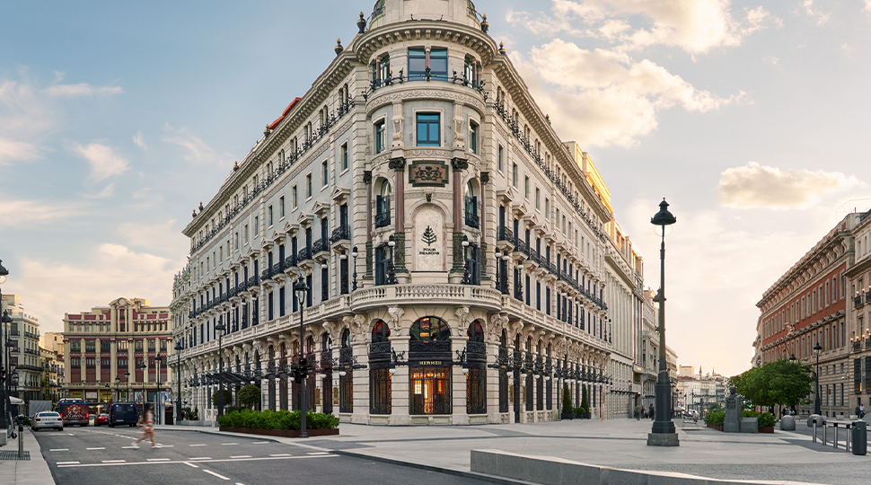 Exterior of flatiron-syle building in Madrid