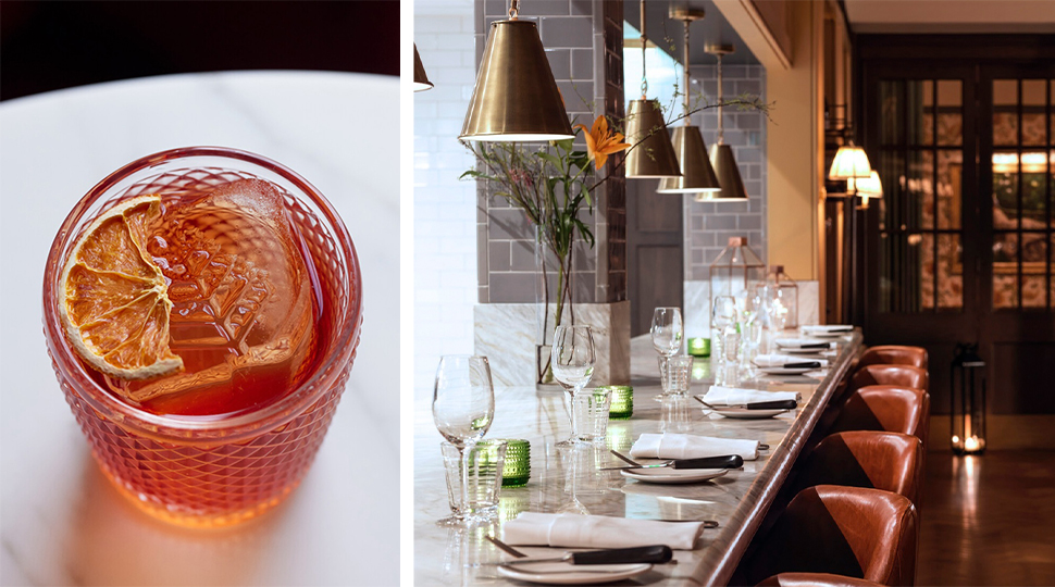 Split image of an orange-colored cocktail on the left and an image of a marble-top bar, with brown leather stools and gold hanging lights on the right